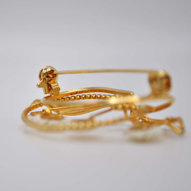 Broche filigrana hueso