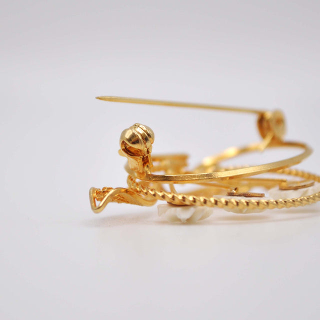 Broche filigrana hueso